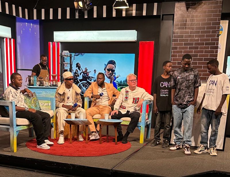CCF Academy members on a Kigali TV talk-show set with the patron and presenters.